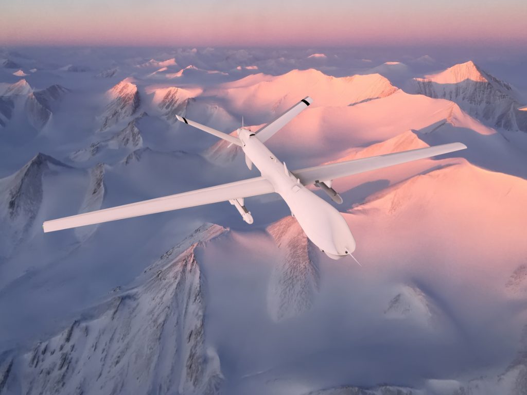 Military RC military drone flies against the background of beautiful Arctic ice mountains